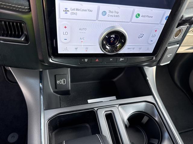 new 2025 Ford F-150 Lightning car, priced at $63,990