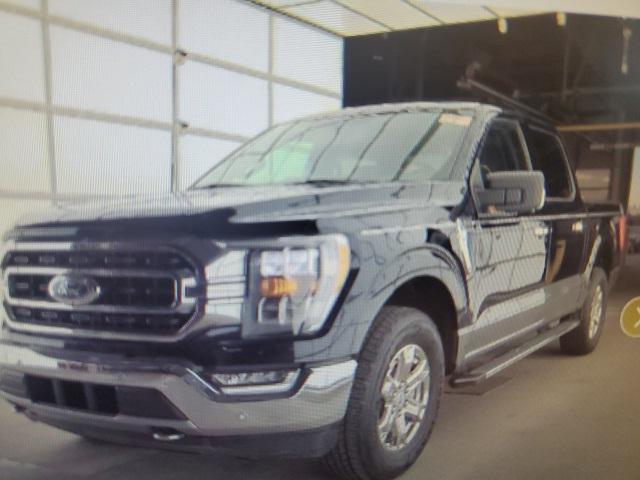 used 2021 Ford F-150 car, priced at $35,392