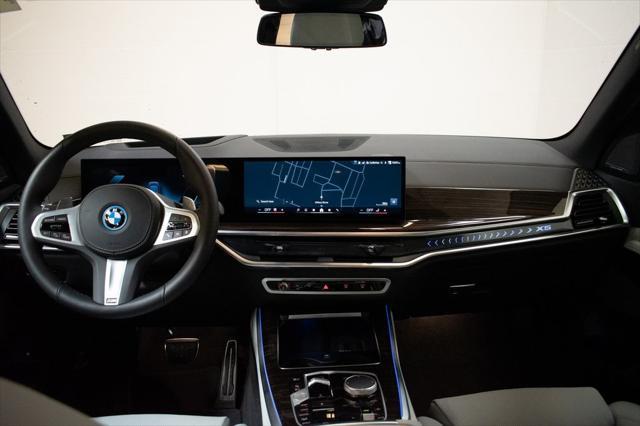 used 2025 BMW X5 PHEV car, priced at $76,142