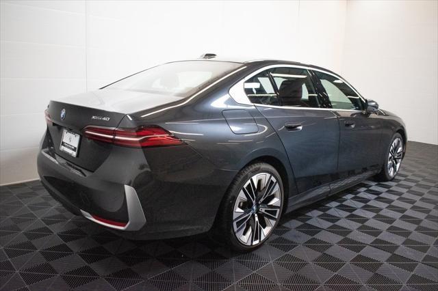 used 2025 BMW i5 car, priced at $62,250