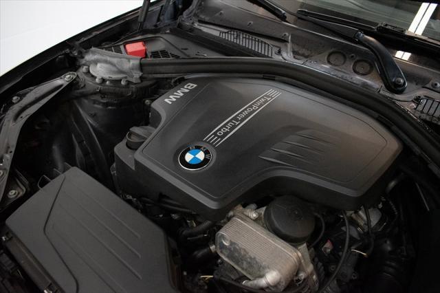 used 2016 BMW 228 car, priced at $18,000