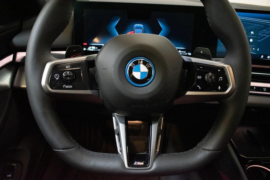used 2025 BMW 550e car, priced at $69,995