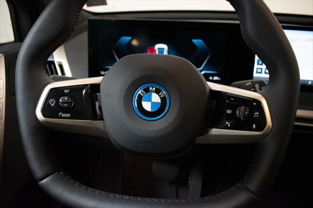 new 2024 BMW iX car, priced at $95,095