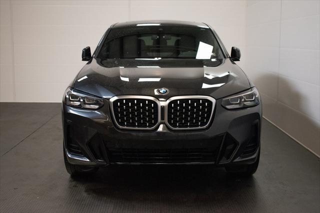 used 2022 BMW X4 car, priced at $38,996