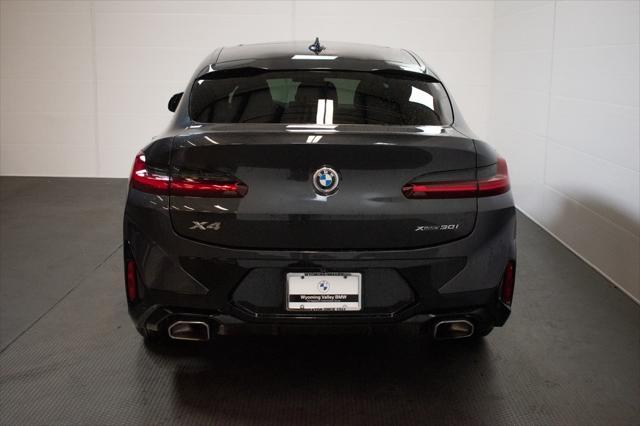 used 2022 BMW X4 car, priced at $38,996