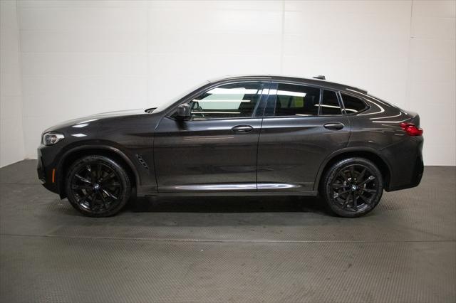 used 2022 BMW X4 car, priced at $38,996