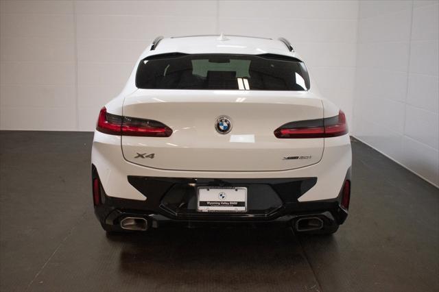 used 2022 BMW X4 car, priced at $32,289