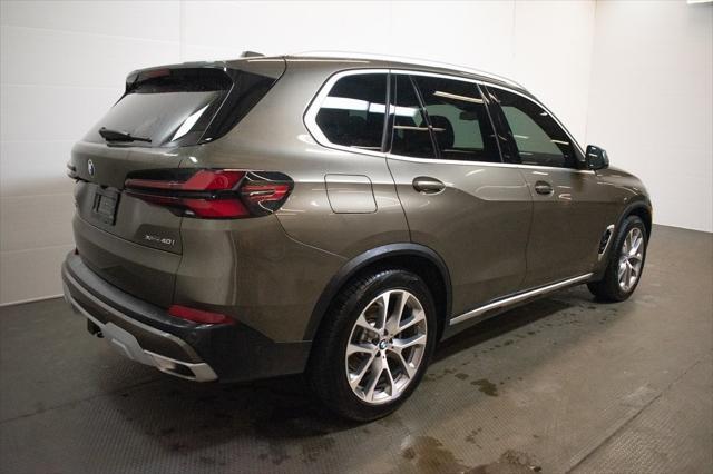 used 2024 BMW X5 car, priced at $65,000