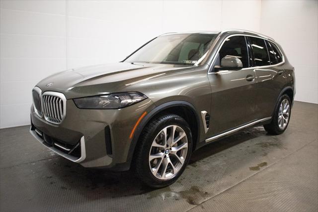 used 2024 BMW X5 car, priced at $65,000