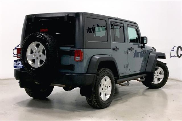 used 2014 Jeep Wrangler Unlimited car, priced at $18,299