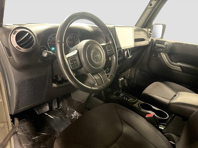 used 2015 Jeep Wrangler Unlimited car, priced at $16,795