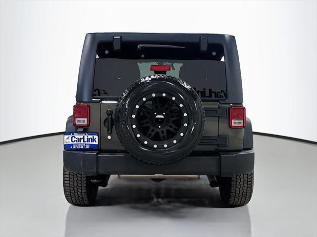 used 2015 Jeep Wrangler Unlimited car, priced at $16,795