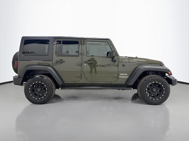 used 2015 Jeep Wrangler Unlimited car, priced at $16,795