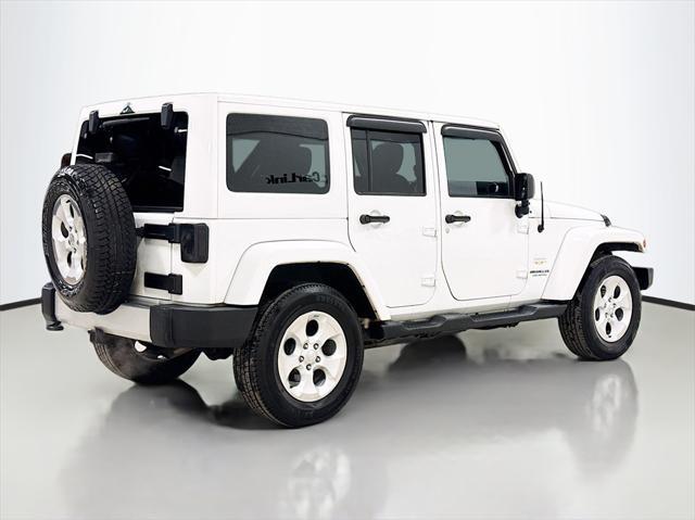 used 2015 Jeep Wrangler Unlimited car, priced at $15,499