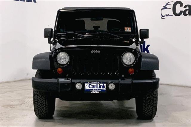 used 2013 Jeep Wrangler Unlimited car, priced at $15,292