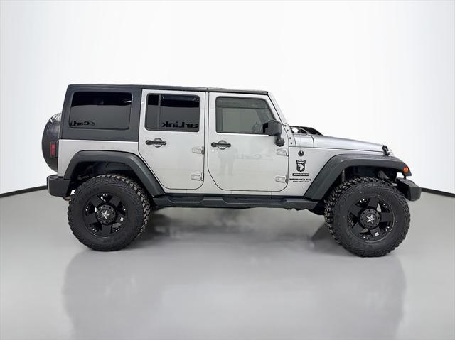 used 2015 Jeep Wrangler Unlimited car, priced at $15,499