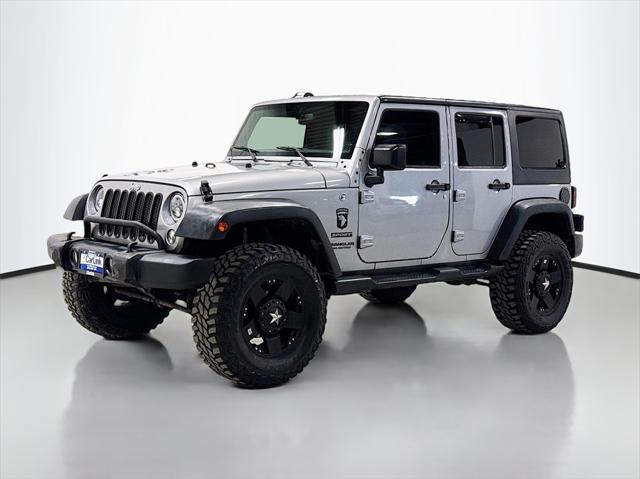 used 2015 Jeep Wrangler Unlimited car, priced at $16,499