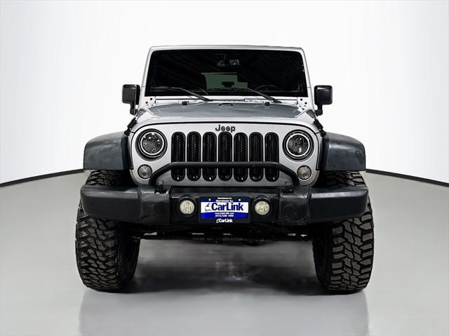 used 2015 Jeep Wrangler Unlimited car, priced at $16,499