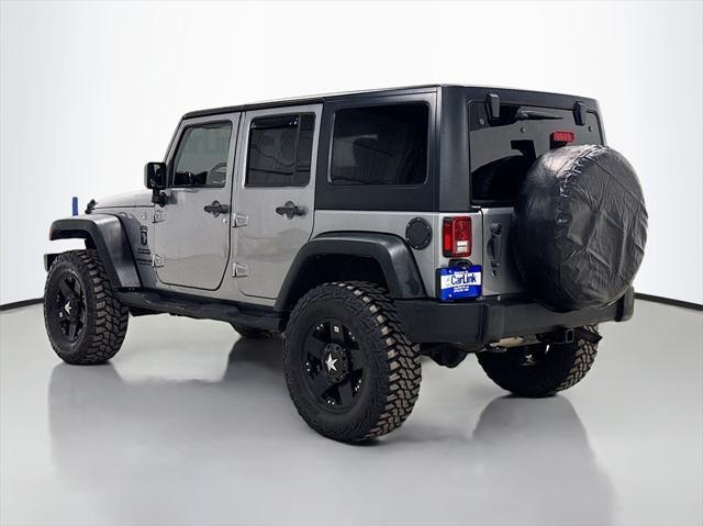 used 2015 Jeep Wrangler Unlimited car, priced at $16,499