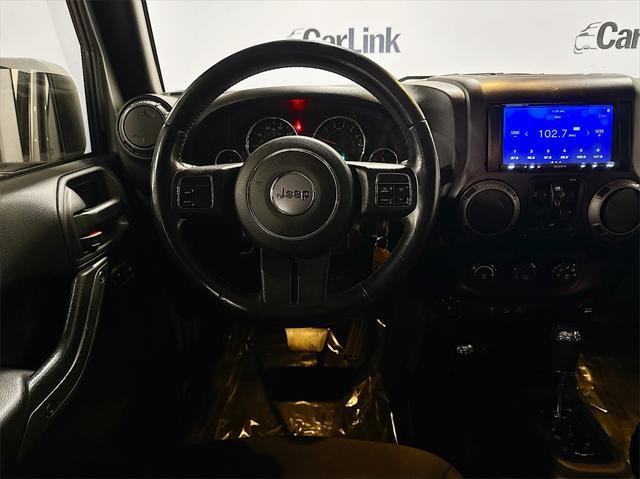 used 2015 Jeep Wrangler Unlimited car, priced at $16,499