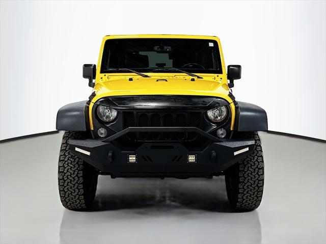 used 2015 Jeep Wrangler car, priced at $13,995