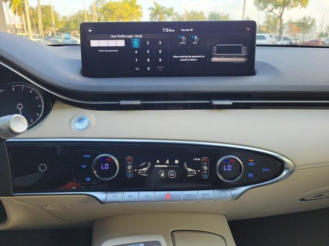 used 2023 Genesis GV70 car, priced at $37,800