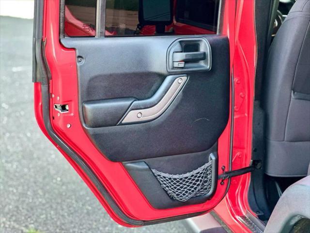 used 2013 Jeep Wrangler Unlimited car, priced at $13,995