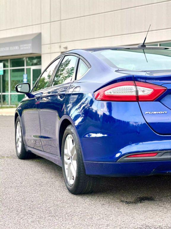 used 2016 Ford Fusion car, priced at $8,990