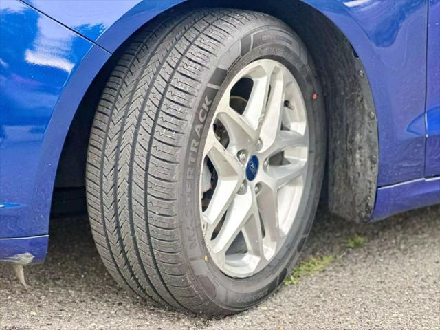 used 2016 Ford Fusion car, priced at $8,990
