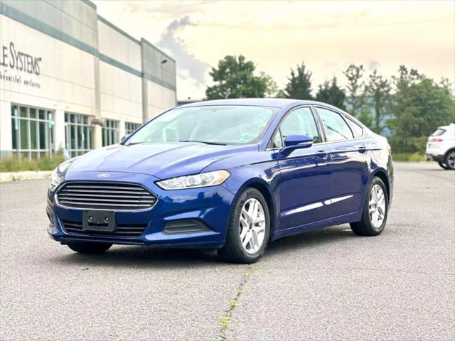 used 2016 Ford Fusion car, priced at $8,990