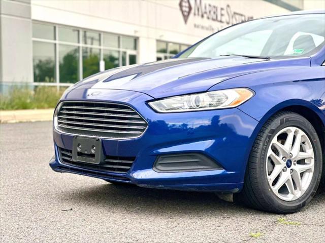 used 2016 Ford Fusion car, priced at $8,990