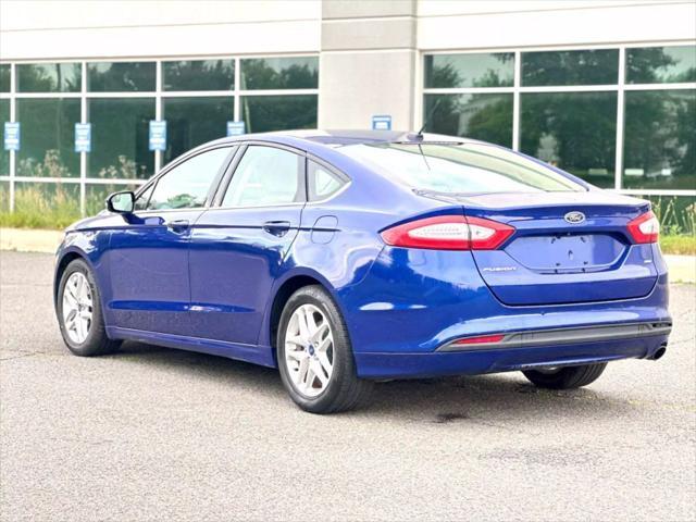 used 2016 Ford Fusion car, priced at $8,990