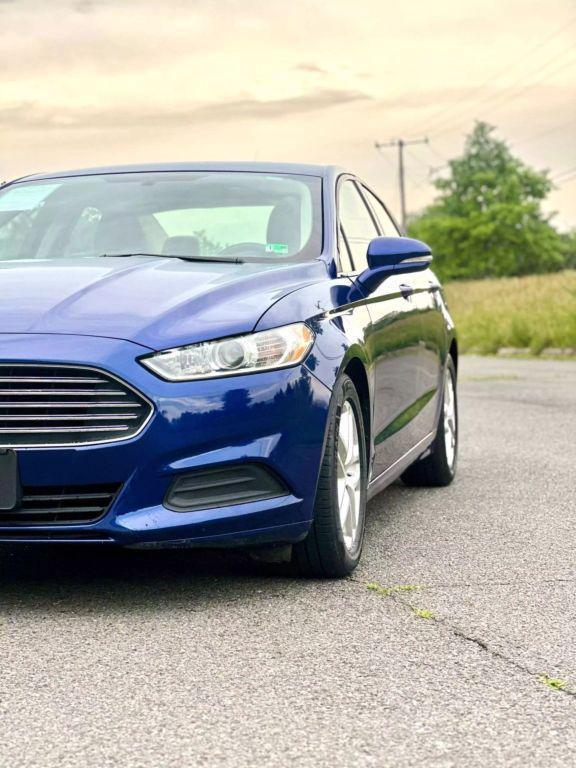 used 2016 Ford Fusion car, priced at $8,990