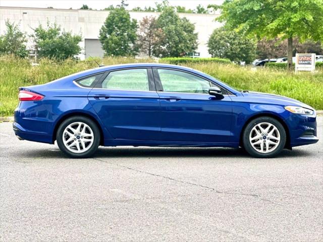 used 2016 Ford Fusion car, priced at $8,990