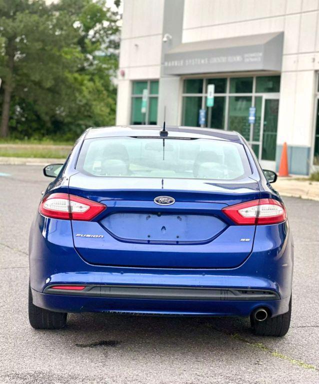 used 2016 Ford Fusion car, priced at $8,990