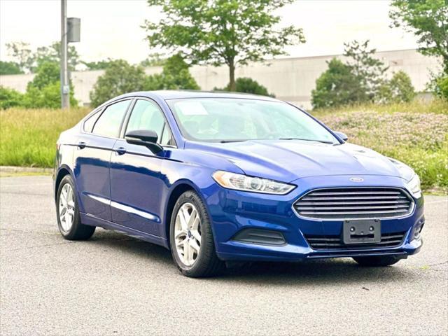 used 2016 Ford Fusion car, priced at $8,990