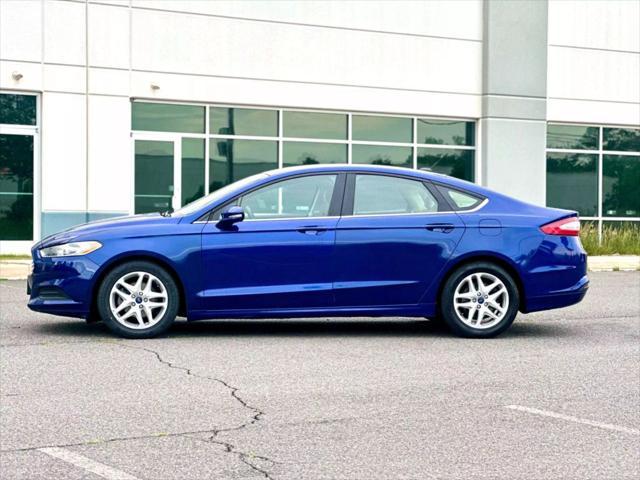 used 2016 Ford Fusion car, priced at $8,990