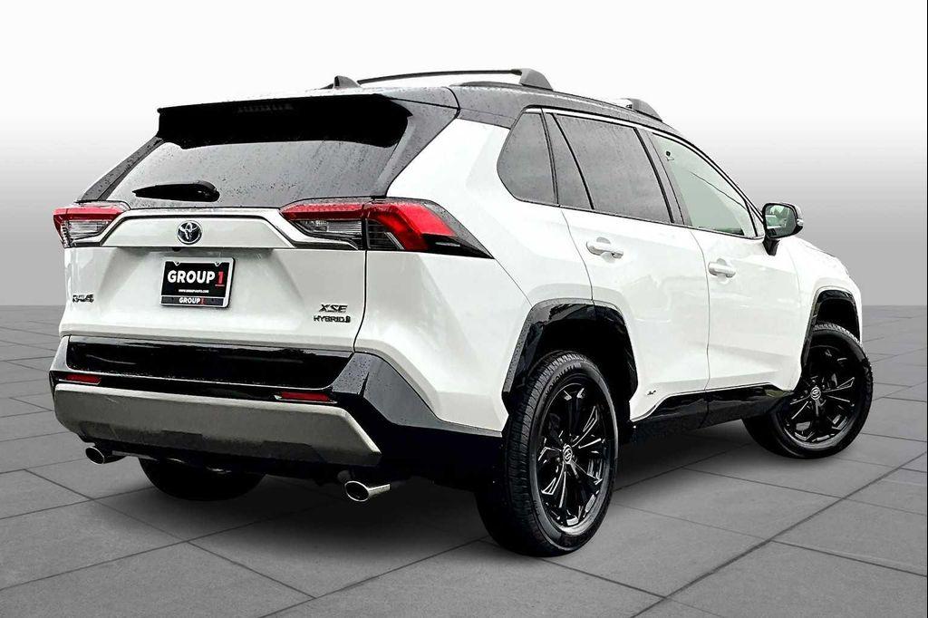 used 2023 Toyota RAV4 Hybrid car, priced at $33,883
