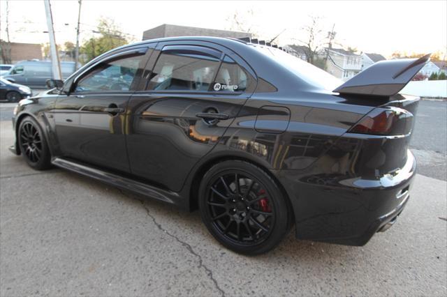 used 2014 Mitsubishi Lancer Evolution car, priced at $34,995