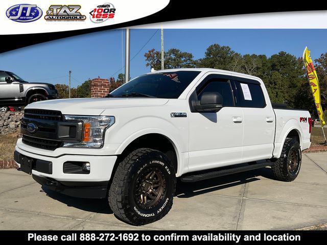 used 2018 Ford F-150 car, priced at $32,602