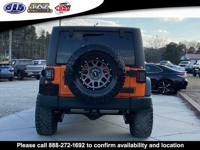 used 2013 Jeep Wrangler Unlimited car, priced at $17,911