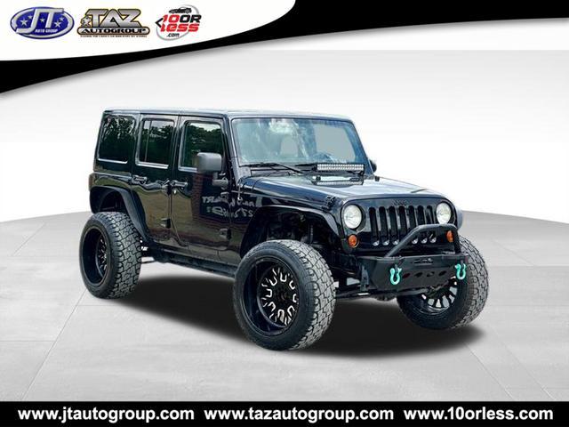 used 2012 Jeep Wrangler Unlimited car, priced at $17,949