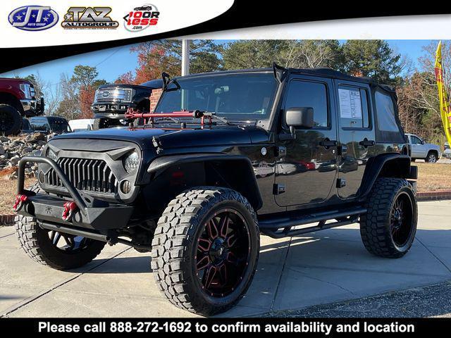 used 2011 Jeep Wrangler Unlimited car, priced at $15,142