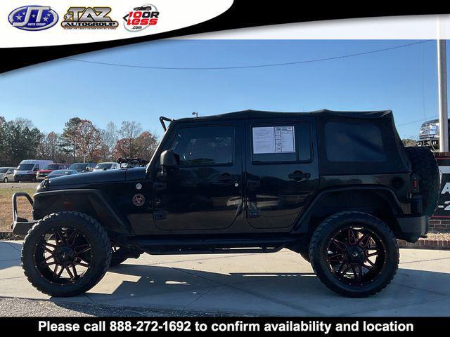 used 2011 Jeep Wrangler Unlimited car, priced at $15,142