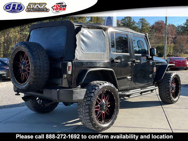 used 2011 Jeep Wrangler Unlimited car, priced at $15,142