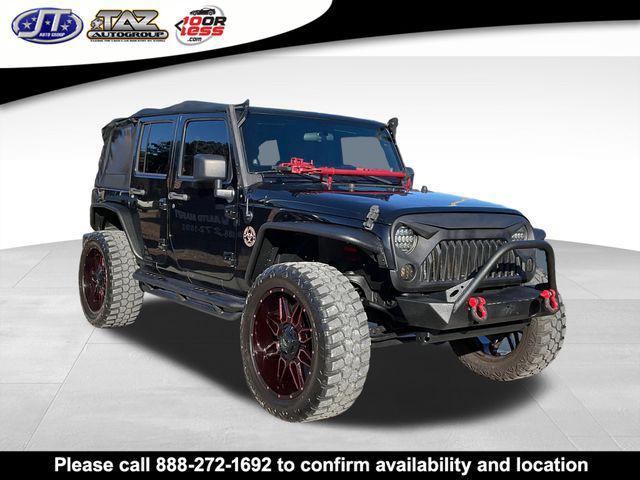 used 2011 Jeep Wrangler Unlimited car, priced at $15,142