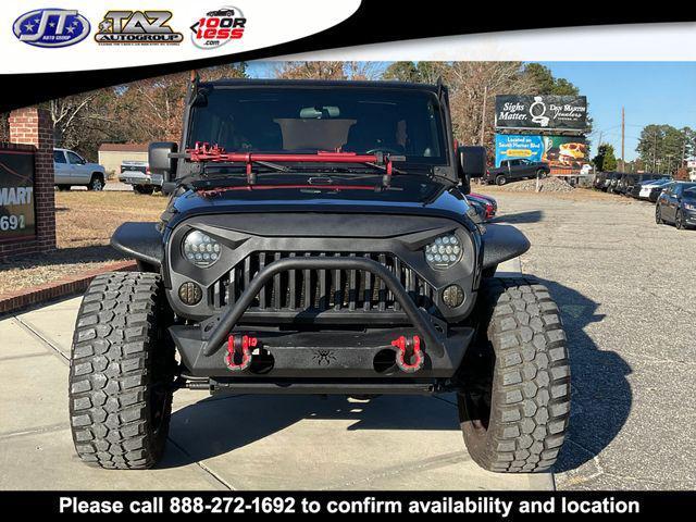 used 2011 Jeep Wrangler Unlimited car, priced at $15,142