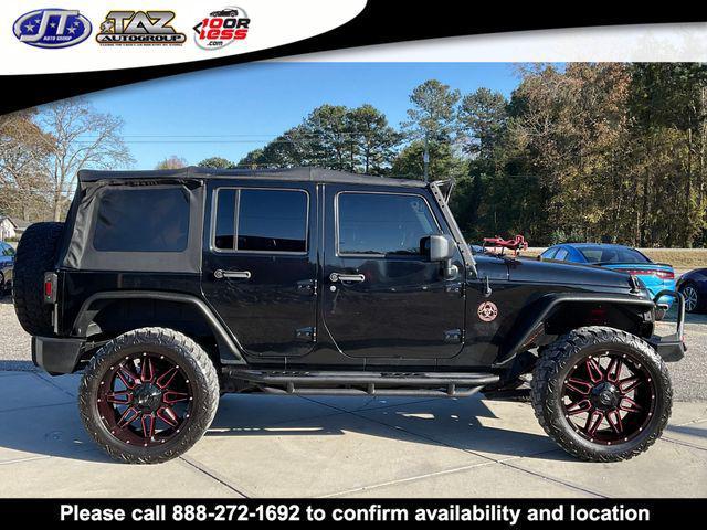 used 2011 Jeep Wrangler Unlimited car, priced at $15,142