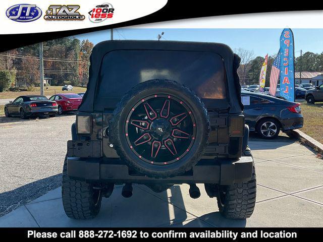 used 2011 Jeep Wrangler Unlimited car, priced at $15,142