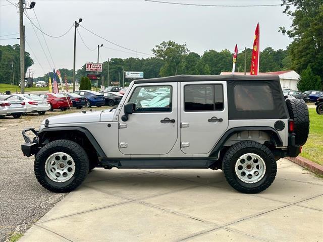 used 2014 Jeep Wrangler Unlimited car, priced at $14,112